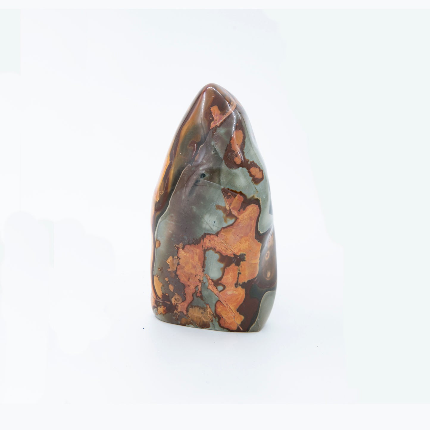 Madagascar Polychrome Jasper. Beautiful colors and patterns. Size: 9 inches tall and 3 inches wide. Shamans call this a stone of stability and grounding.