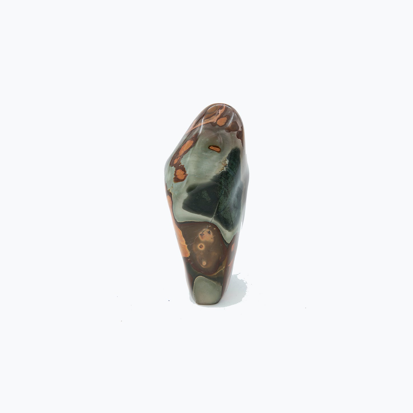 Madagascar Polychrome Jasper. Beautiful colors and patterns. Size: 9 inches tall and 3 inches wide. Shamans call this a stone of stability and grounding.
