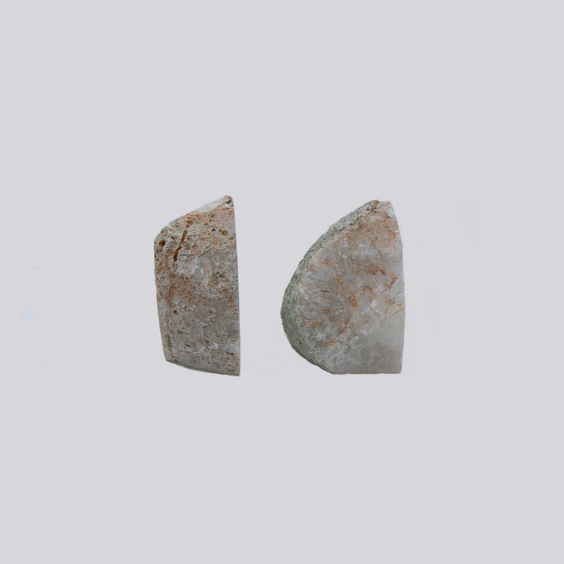 Quartz Starburst Bookends.  Gorgeous set of bookends with a wild starburst Quartz and clear Agate pattern within.  These were sourced in Brazil.  Set measures 4 inches tall by 4.5 inches wide.