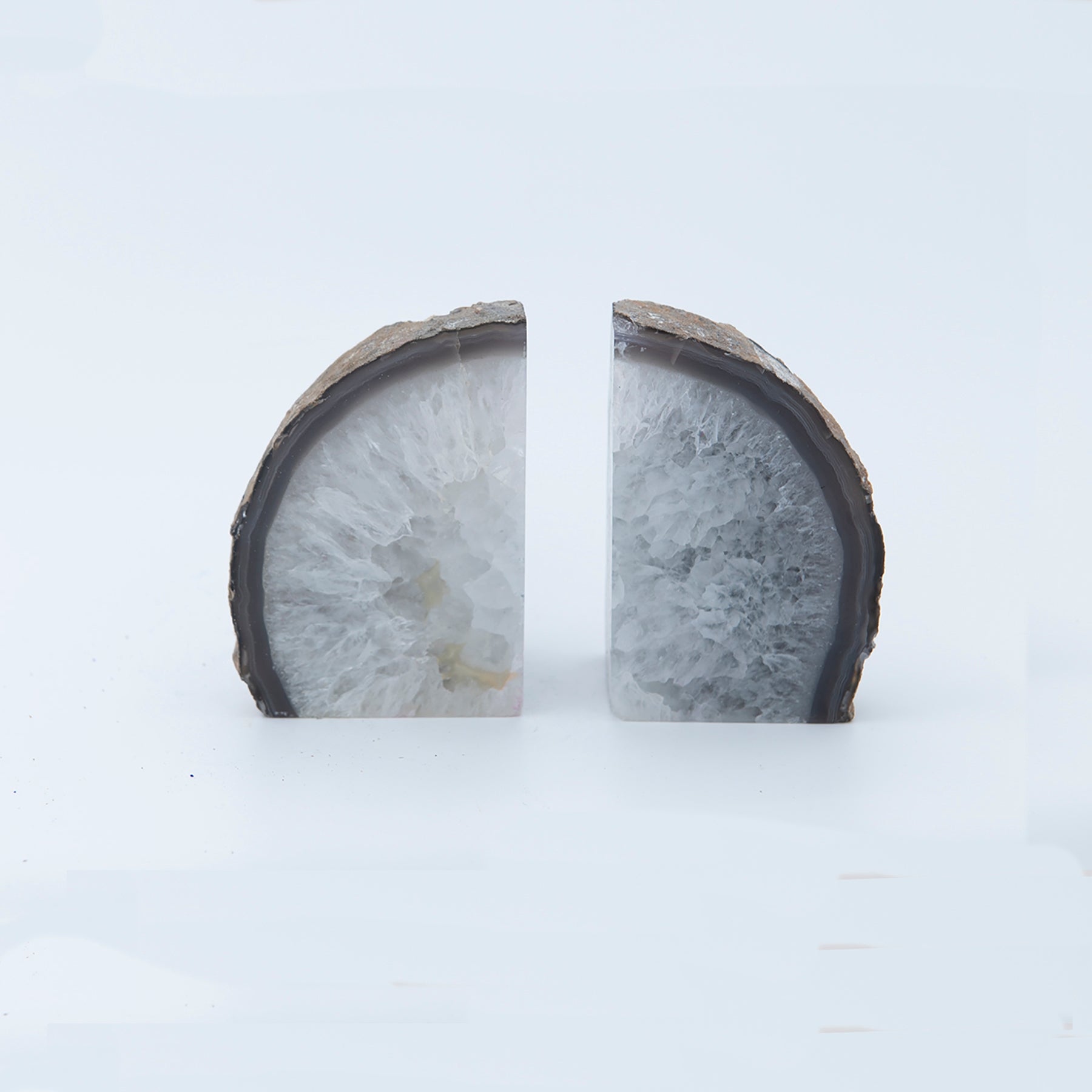 Large Starburst Quartz / Clear Agate Book Ends.  Beautiful Starburst pattern.  Sourced in Brazil.  Great polish.  Size of set is 6 inches high and 8 inches wide.  These are large and impressive.  Heavy too.