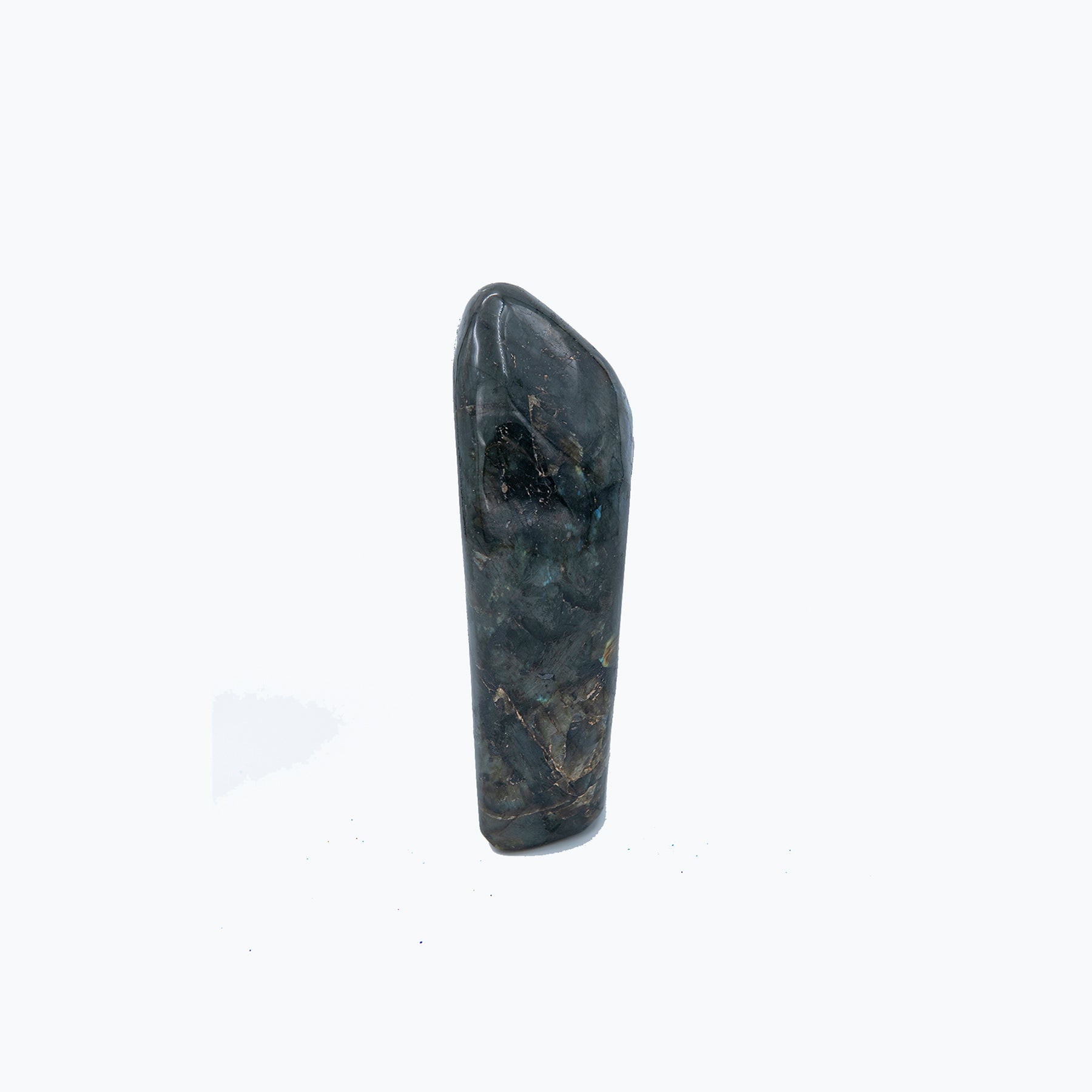 Labradorite Stand Up Display Piece.  This piece has a beautiful glow to it and changes colors as you turn it in the sun.  Sourced, cut and polished in Madagascar.   Labradorite is said to have dream-enhancing properties as well as facilitating manifesting those dreams into reality.  This piece is 7 inches tall and 2.5 inches wide.