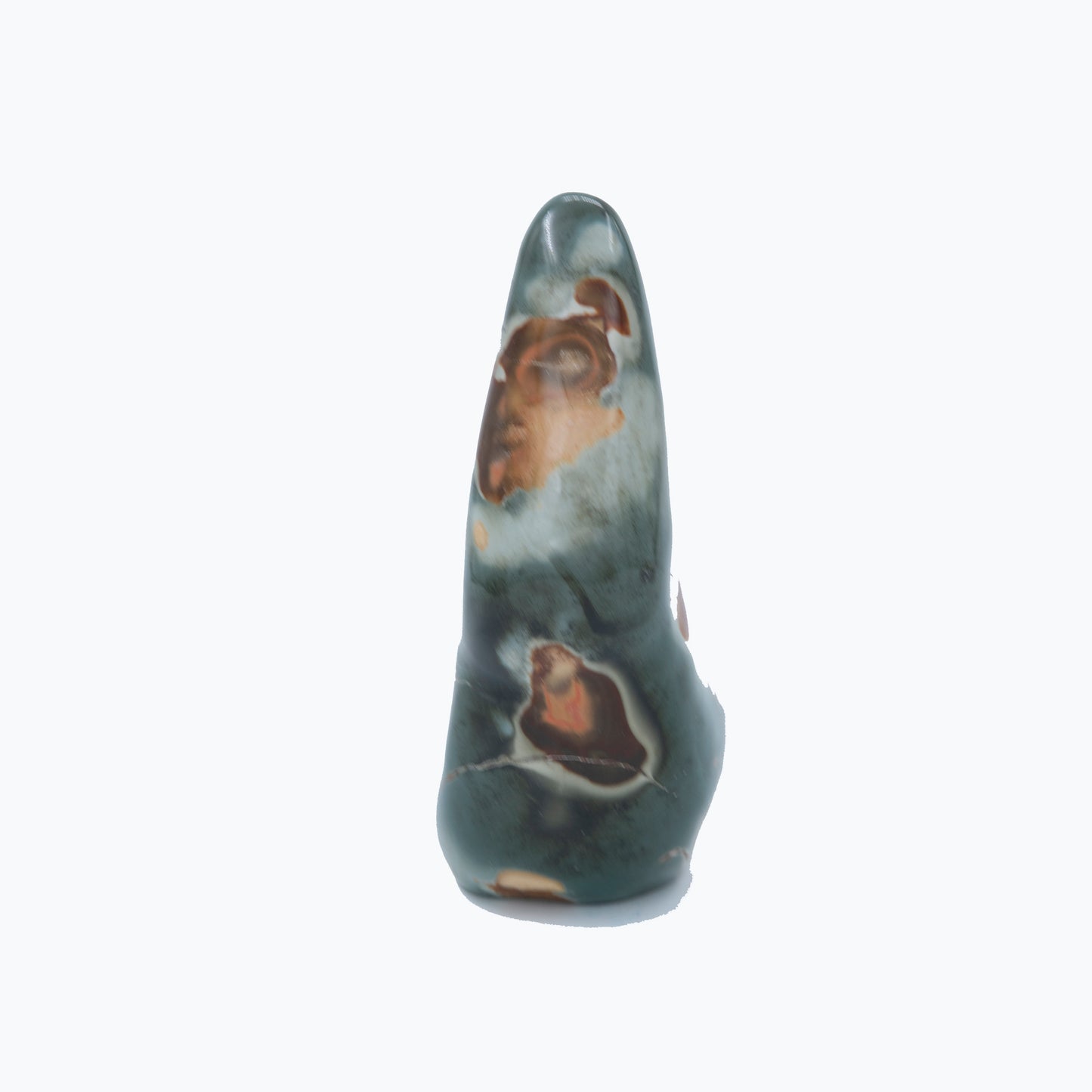 Madagascar Polychrome Jasper.   Exquisite shape and contrast.  Smooth, fine polish.  Size: 9 inches tall x 3 inches wide.  Metaphysical lore says Polychrome Jasper is a stone of grounding, strength and enhancing your ability to access your inner knowledge.