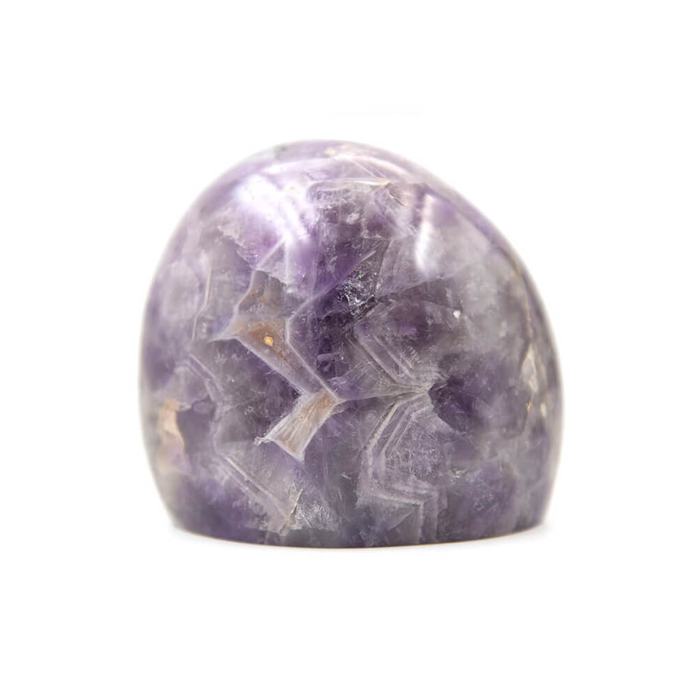 A very nice pattern and color to this Chevron Amethyst. 3.5x3.5x2 inches. This stone is said to have the same properties but be more powerful than regular Amethyst. Peace protection and harmony are said to be among its properties.