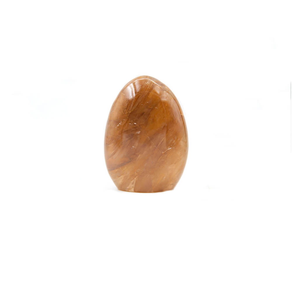 Golden Healer Quartz standup stone. Super healer golden color, beautifully striated all the way through. 4x3x1.5 inches A very beautiful piece.