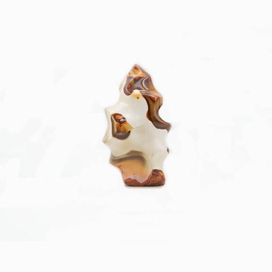Fine Imperial Jasper hand carved into flame spiral shape.  Varied colors and patterns make this a super interesting piece. Over 5 inches tall, over 2.5 inches wide and almost 2 inches deep.