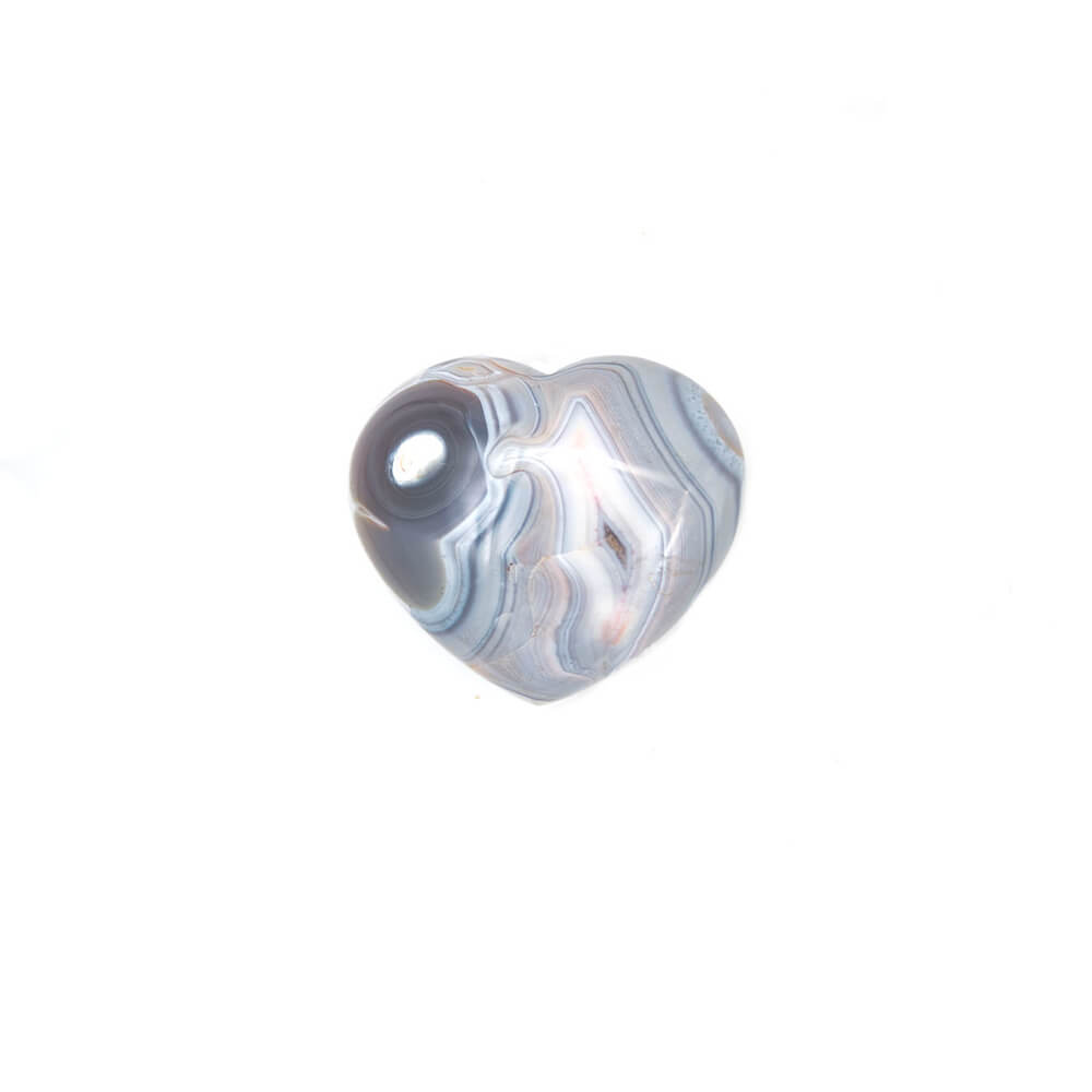 Dazzling Banded Agate heart.  Superior polish and color display. Gray and cream swirls with small color accents of pink. Beautiful fortification lines make wild patterns. 3x2.5 x over an inch thick. Channelers say that this stone can calm restless energy, clear anxious feelings and focus attention where it will do the most good.