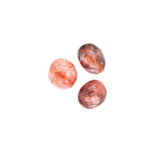 Nice sized Quartz with Red Iron inclusions. 2.5 to 3 inches in size. These display wonderfully.
