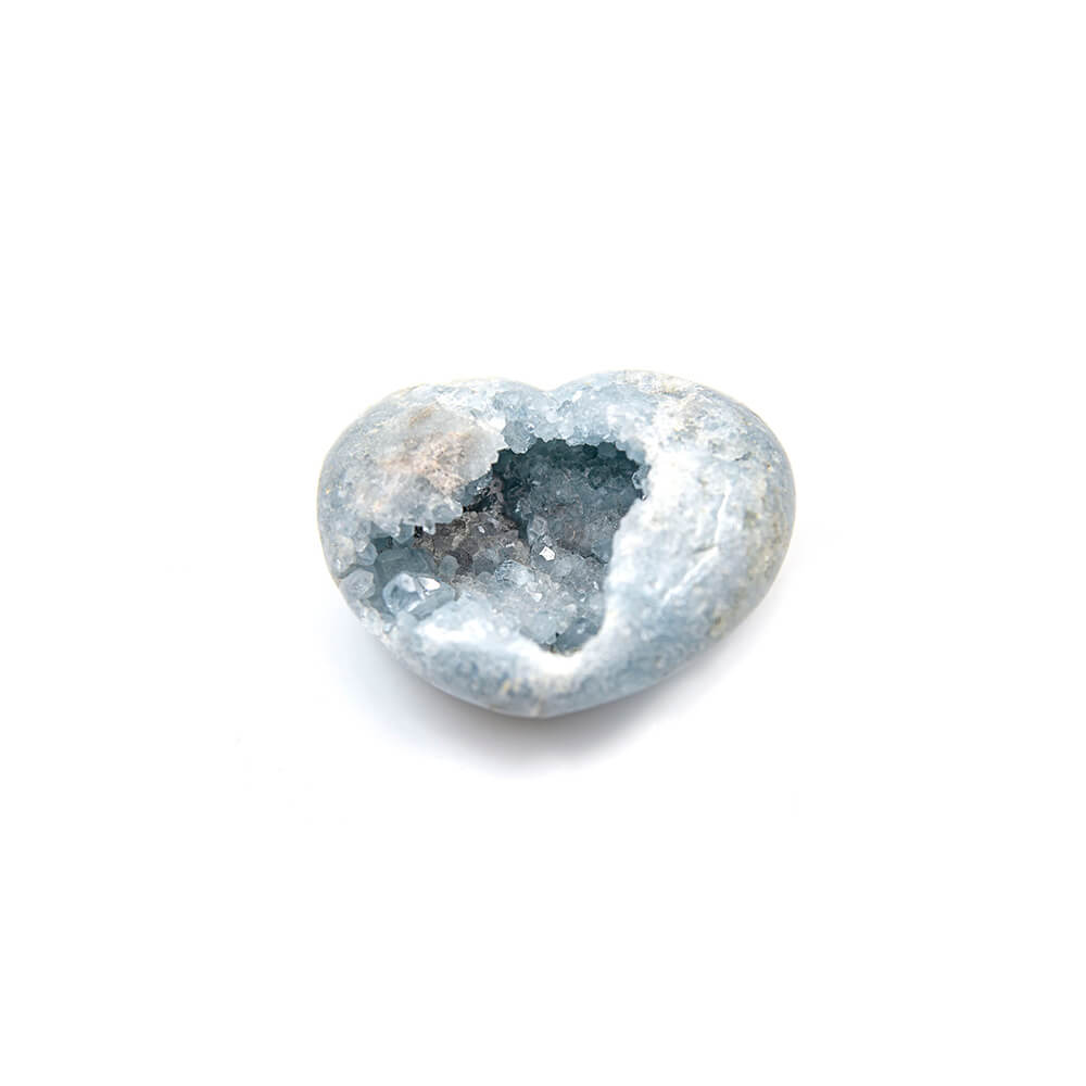 Massive Celestite Heart is 6x5x2.5 inches and weighs almost 5 pounds. Many beautiful light blue crystals inside the center cavern. A unique, lovely piece. The properties of Celestite are said to relate to the celestial realm and help with all manners related to astral travel, out of body experiences and heavenly endeavors.