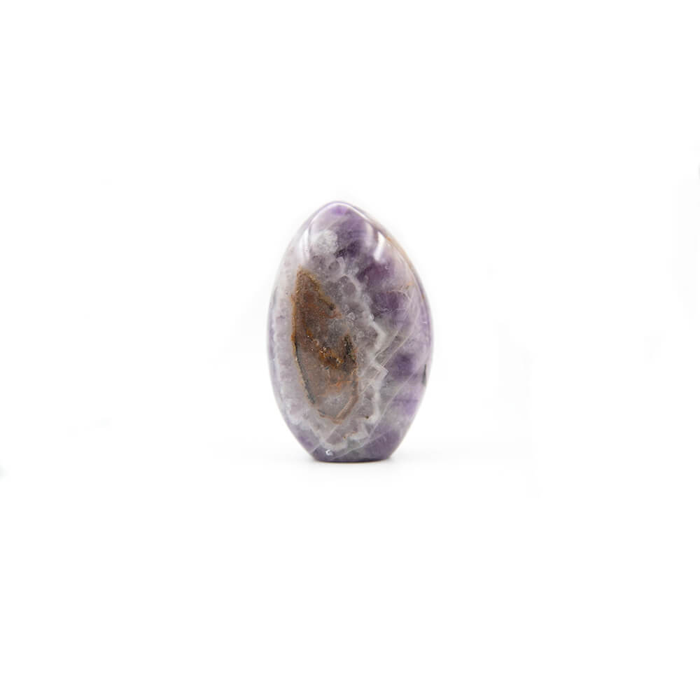Nice colors and visible crystal patterns in this Chevron Amethyst stone. Smooth polish and great shape. Over 4 inches tall 3 wide and 2 thick. This stone is said to have the same properties but be more powerful than regular Amethyst. Peace protection and harmony are said to be among its properties.  You will receive the piece pictured.