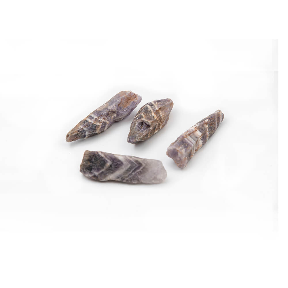 Natural Chevron Amethyst crystals in the rough. 2.5-3 inches each. Wild purple and white striped pattern with assorted orange accents. This stone is said to have the same properties but be more powerful than regular Amethyst. Peace, protection and harmony are said to be among its properties.