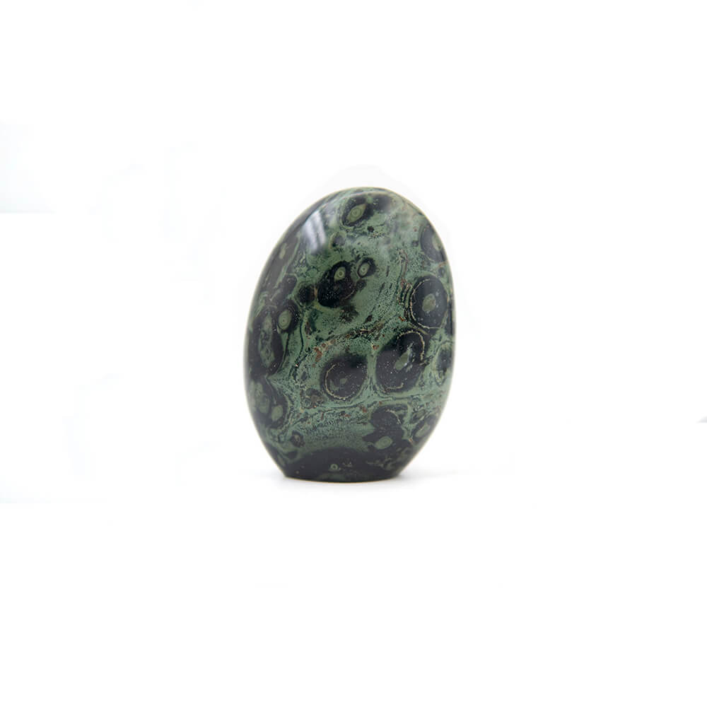 A very striking Kambala Stone with lots of character. Orbs all over and nice play of colors with beautiful patterns. Over 4x3 inches and 2 inches thick.