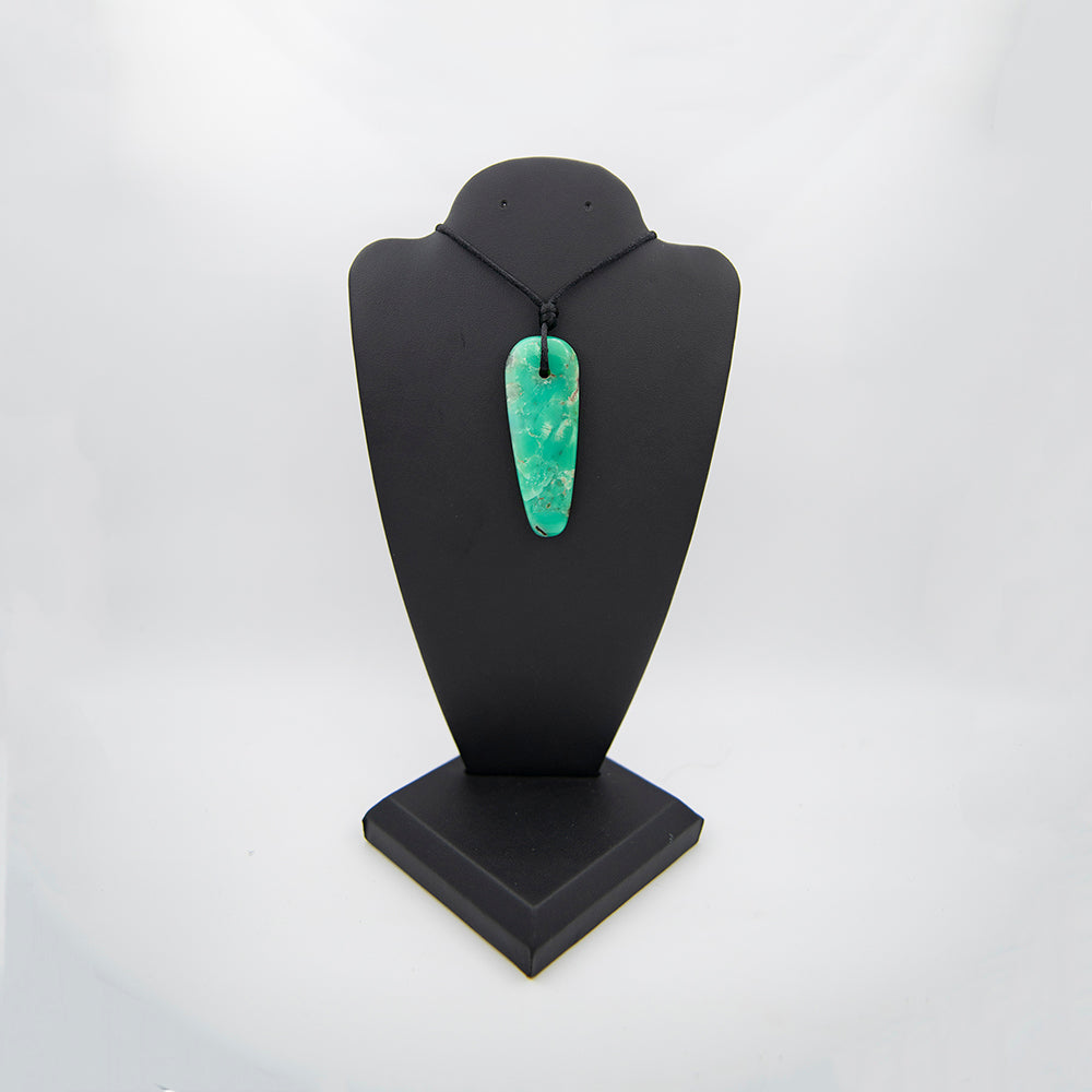 Australian Chrysoprase Pendant.  Wild green Chrysoprase from the famous Marlboro mine in Australia.  Classic shape and beautiful polish. Bright, vivid green color. Handmade in Mendocino CA 2.75 x 1 inch.