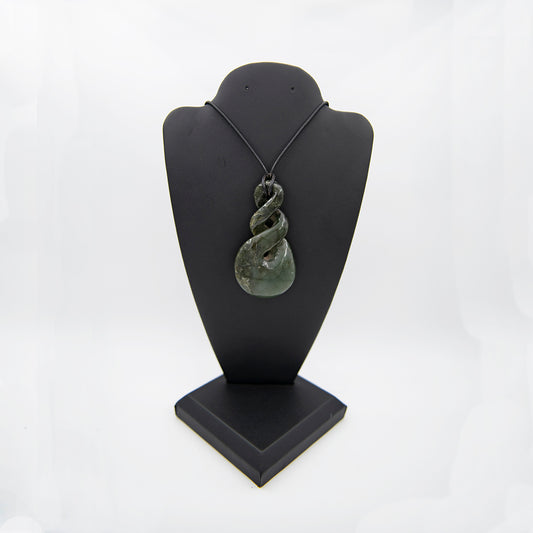 A Large piece carved of rare California undersea Jade!  This was purchased from an Artisan at the Big Sur Jade Festival years ago. I found it wedged in the bottom of an old show box recently so now it is for sale. Very nice Blueish green piece from the only undersea Jade deposit known. Has some translucent features and very smooth polish. 3x1.5 inches