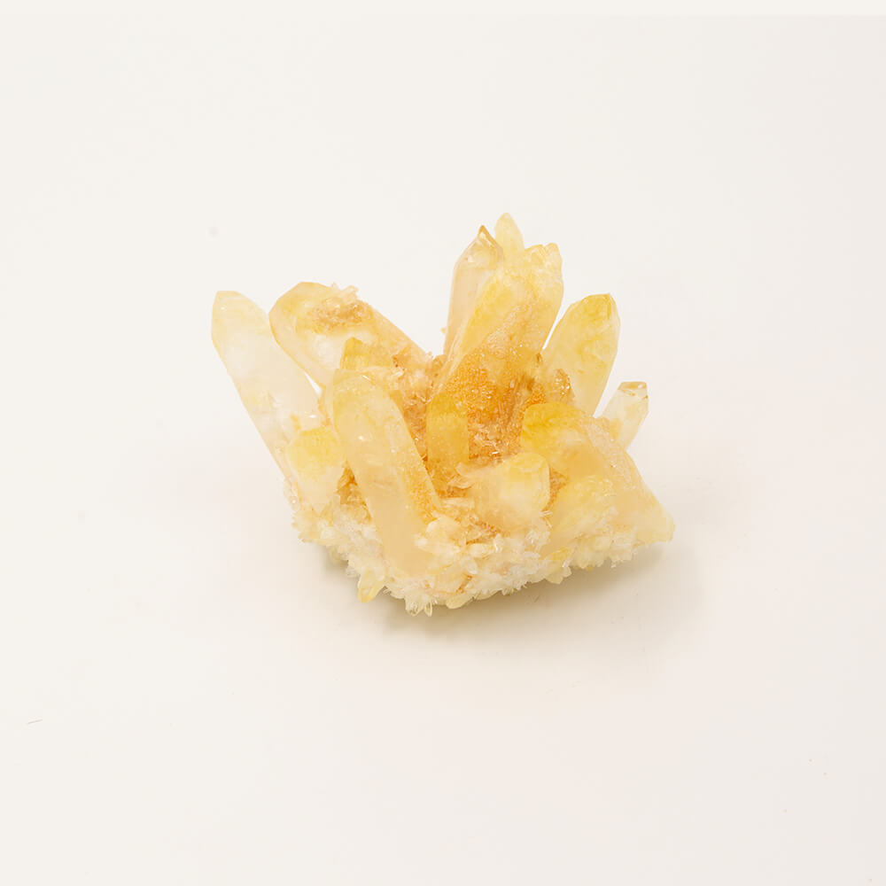 A fine golden Quartz cluster. Size: 3.25x3.25x2.75 inches. Said to be a crystal of healing. Beautiful pale golden color.