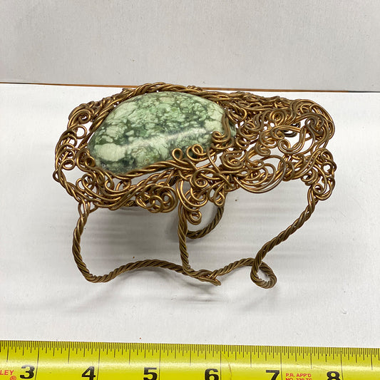 RiverBlossom Jade Arm Cuff Bracelet.  One of a kind.  Brass Wire enclosing massive Jade stone.  The Jade used in this piece was sourced from our helicopter trips to our private property in the Trinity Alps area in California.