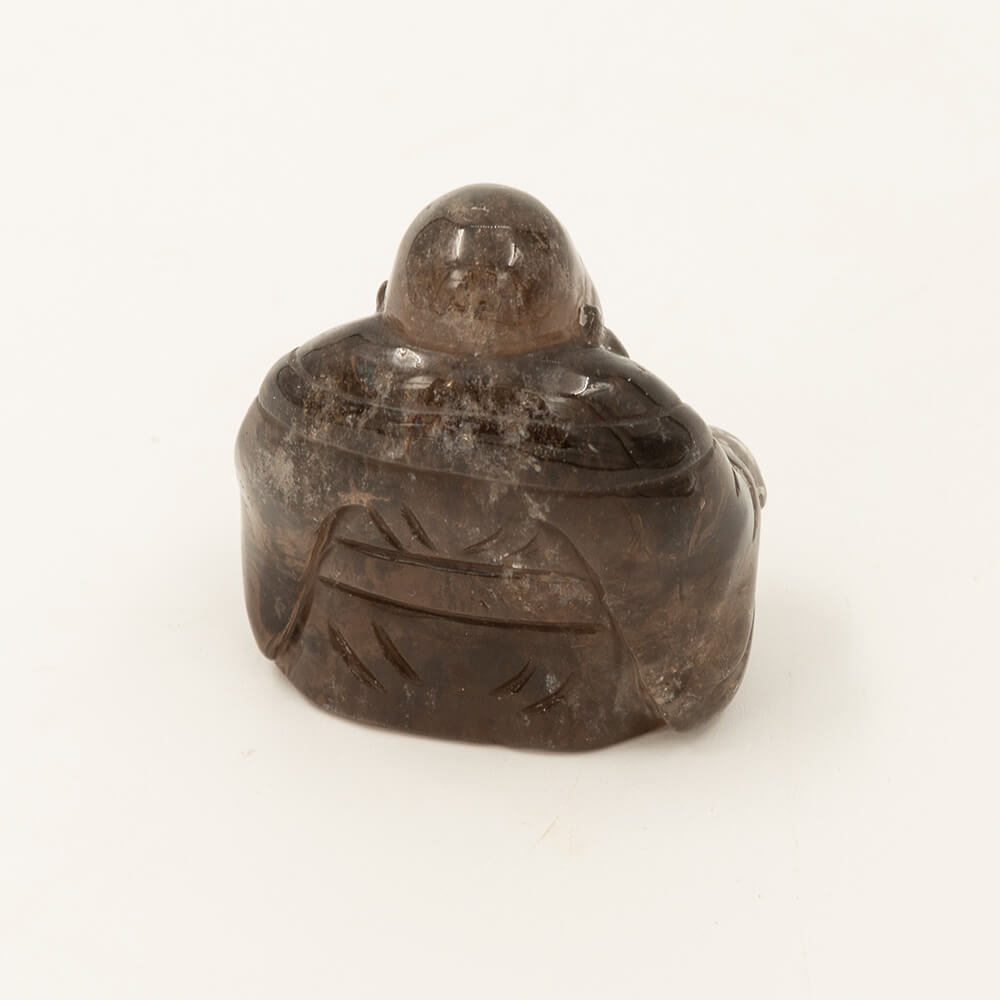 Lustrous Smokey Quartz Buddha carving. Varied earth tones.