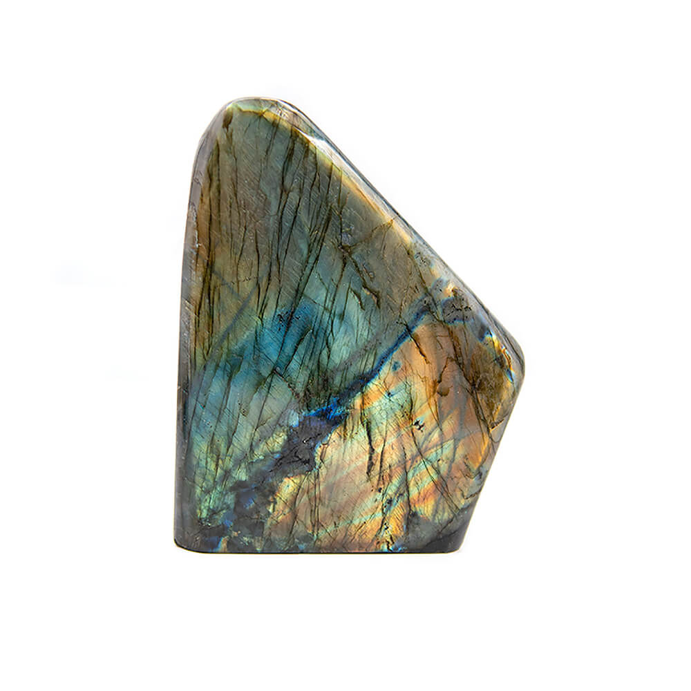 The very best quality Labradorite. Both sides are iridescent everywhere. They just don't get better than this display piece from Madagascar. Almost 7 inches tall, 5 inches wide, over 2 inches thick and weighing close to 5 pounds.