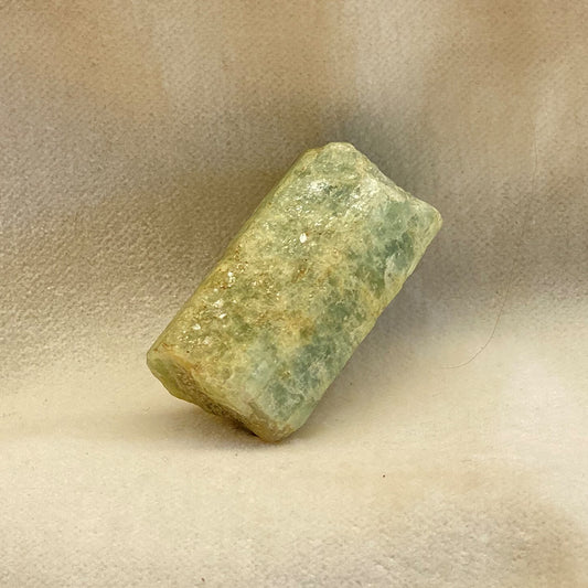 Small Aquamarine Stones with light-catching, crystalized structure and variable green/blue color.  Aquamarine is from Brazil.  Size approx 1 - 1.25 inches.  Aquamarine is said to be a calming water stone that brings peace of mind and happiness.