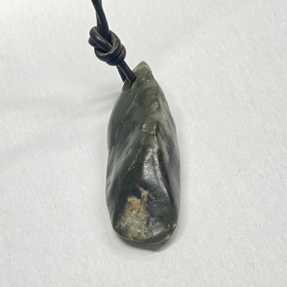 Big Sur Monterey Jade Pebble Pendant. Pebble as found on the beach, then drilled for the cord. Over an inch in size. Big Sur CA is the only place that has an undersea jade deposit.