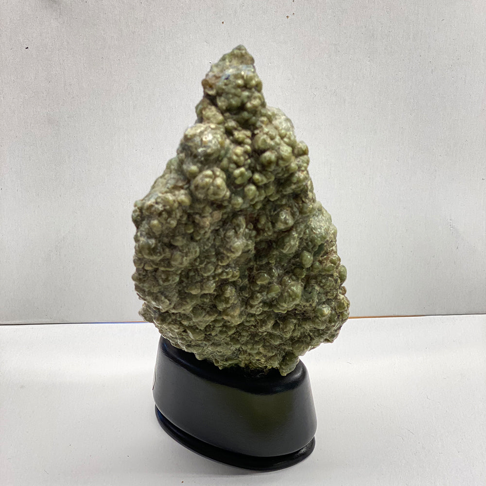 California Botryoidal Jade Stone with Base. Suiseki, or Viewing Stone. Botryoidal ("bubbly jade"). From Covelo, in northern California.This gorgeous masterpiece was extracted directly from a Jade vein at the top of Leech Lake mountain. It has been meticulously cleaned and polished with diamond paste to a sweet luster.