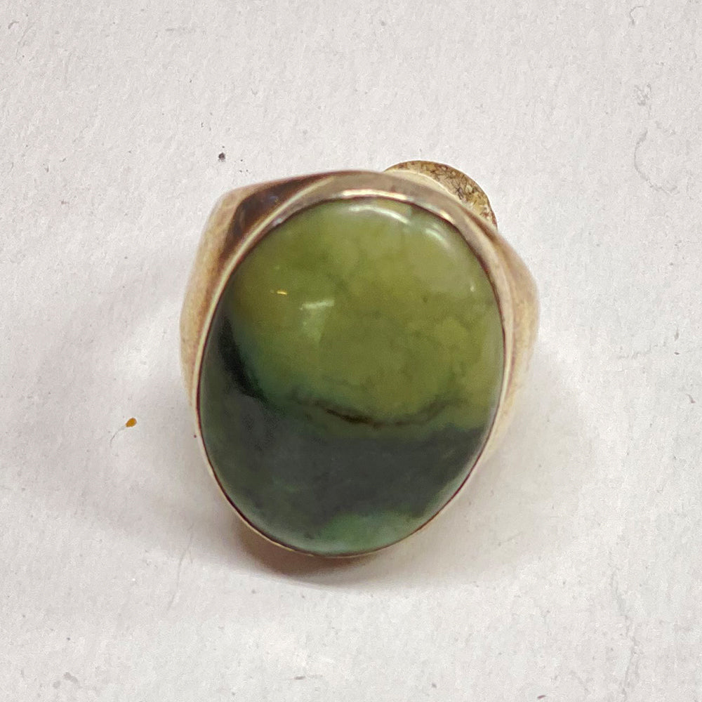 California RiverBlossom Jade 30mm x 22mm large stone surrounded by massive Sterling Silver. 2 tone light and dark attractive pattern. One of a kind. Size 13