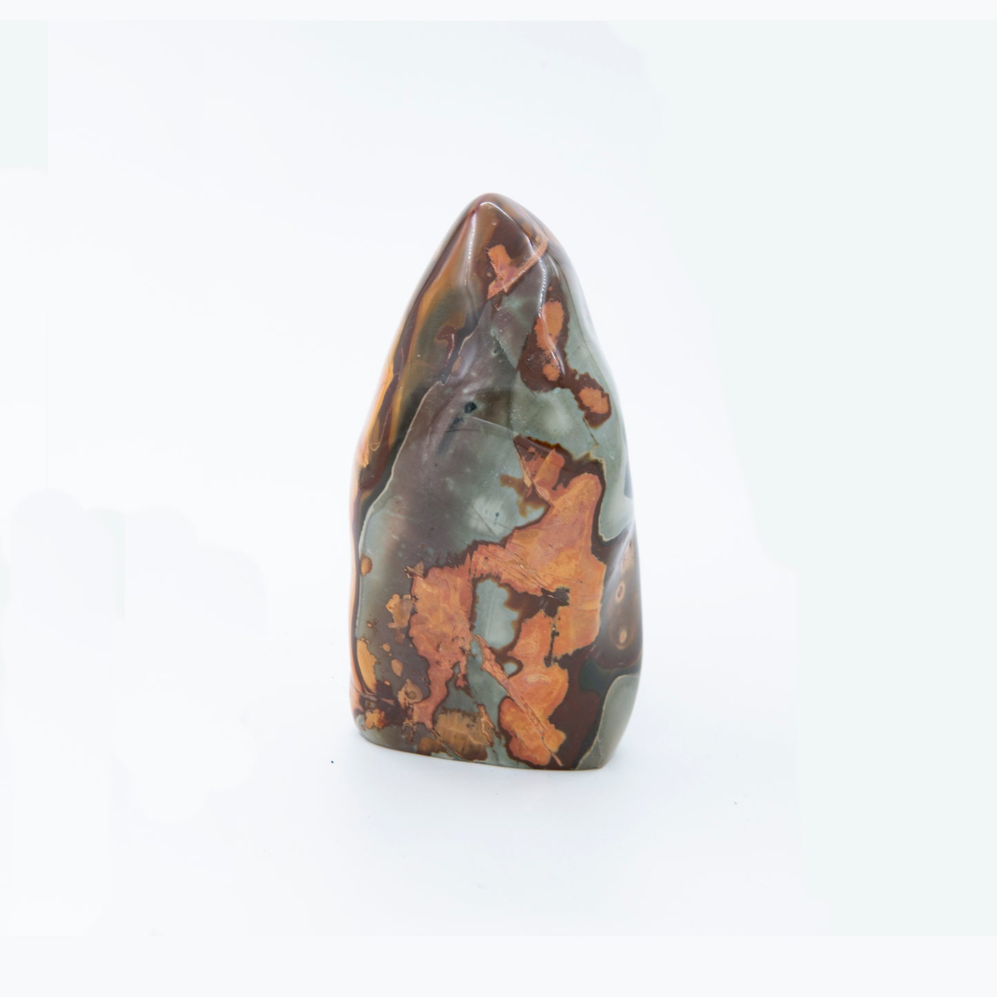 Madagascar Polychrome Jasper.  Beautiful colors and patterns. Size: 9 inches tall and 3 inches wide.  Shamans call this a stone of stability and grounding.