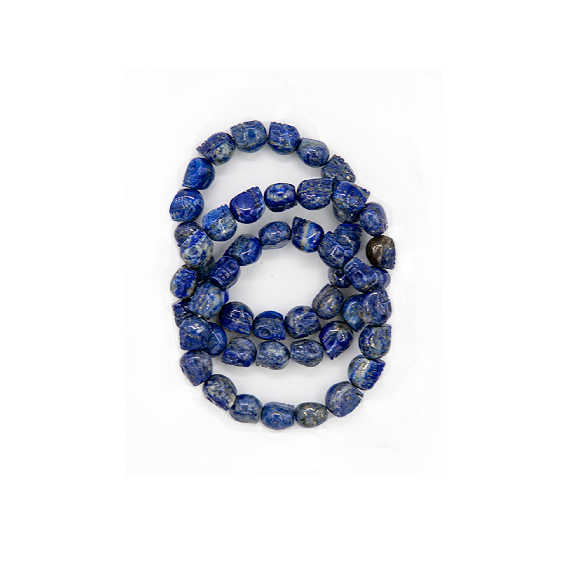 Lapis Lazuli Skull Bracelets.  Very cool, carved blue lapis miniature skull beads strung on stretch cord. Beautiful color.  One size fits most. You will receive one similar to the ones pictured. Skulls are about 3/8 inch in diameter and nicely carved.