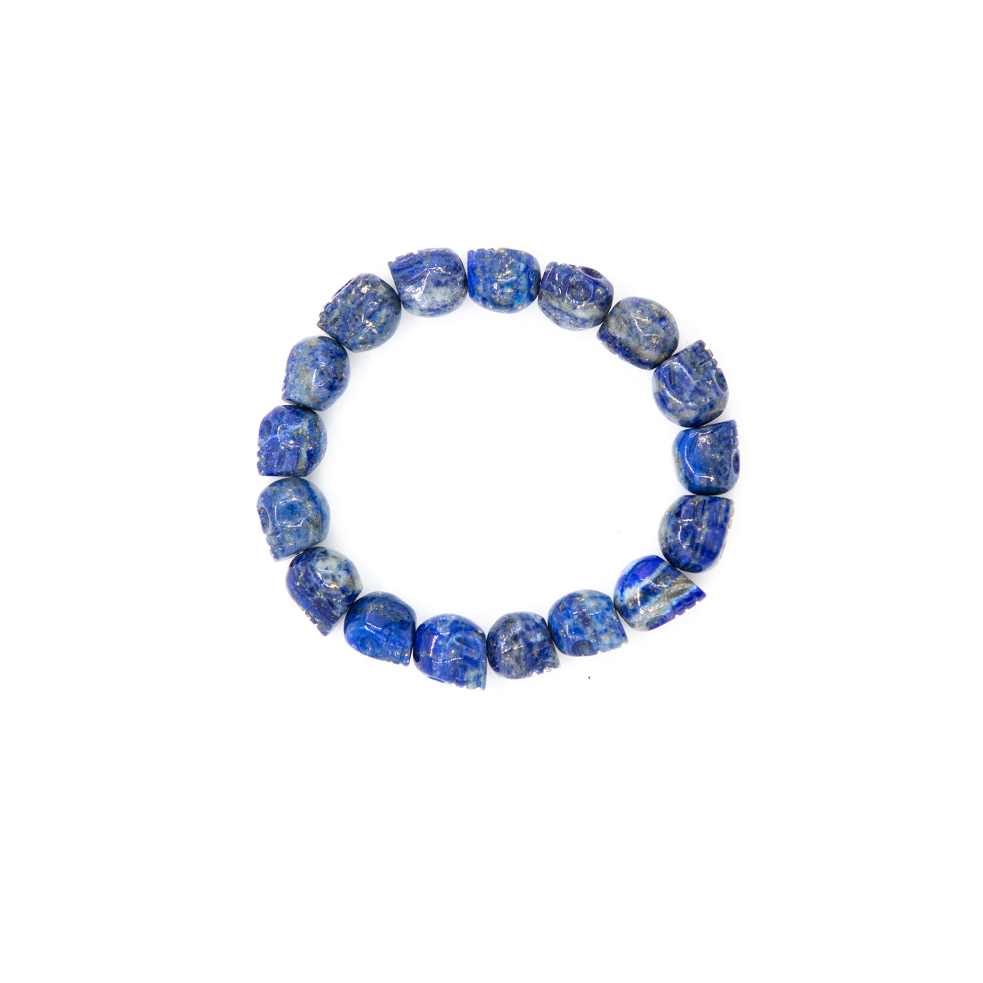 Lapis Lazuli Skull Bracelet.  Very cool, carved blue lapis miniature skull beads strung on stretch cord. Beautiful color.  One size fits most. You will receive one similar to the ones pictured. Skulls are about 3/8 inch in diameter and nicely carved.