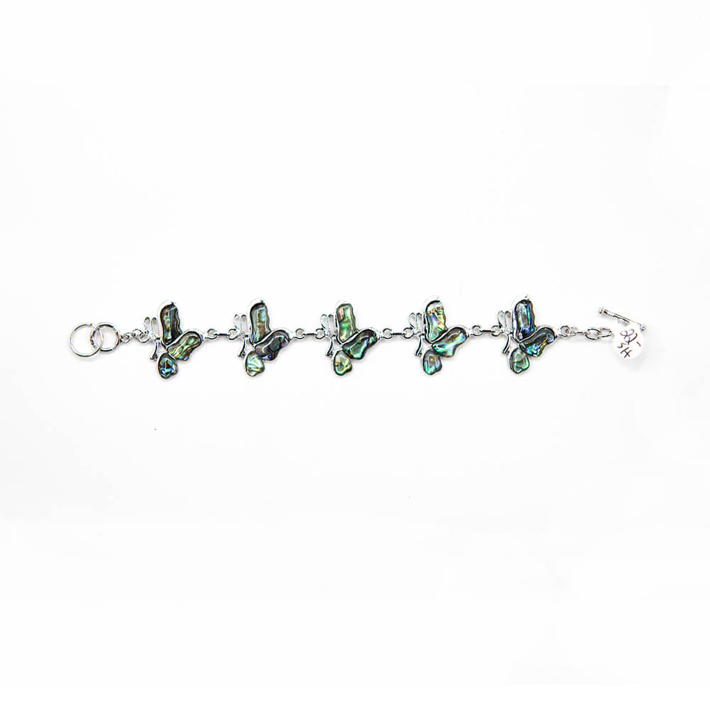 Sweet Paua Abalone shell butterfly bracelet is 8 1/2 inches long. Nice glowing blue hues.