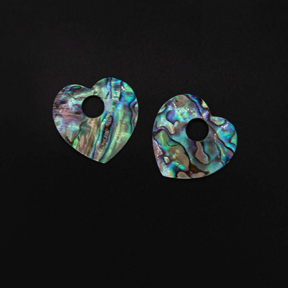 Nice Blue and Rainbow 1 1/2 inch Abalone heart pendants. Light and delicate, iridescent pastel patterns with incredible shine.