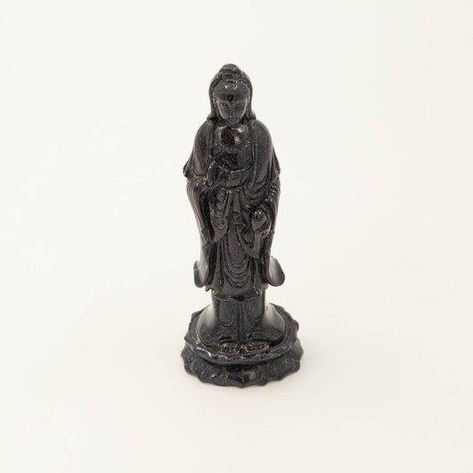 Beautiful, detailed Kwan Yin statue made from Blue Goldstone.  Goldstone is a man-made quartz glass infused with copper particles, invented in 17th century Venice, Italy.  It is said to be an ideal stone for empaths.  Gorgeous, sparkly depth of color.  Size: 6x1.5x2 inches.