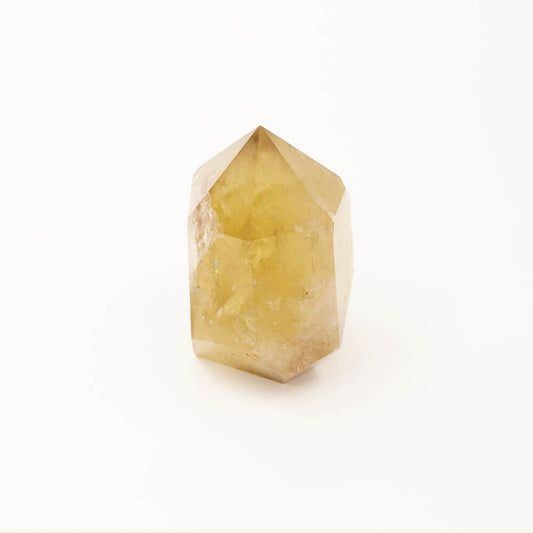 A lovely large Citrine crystal point with greenish hue.  Size: 4.75x3.5x3in.