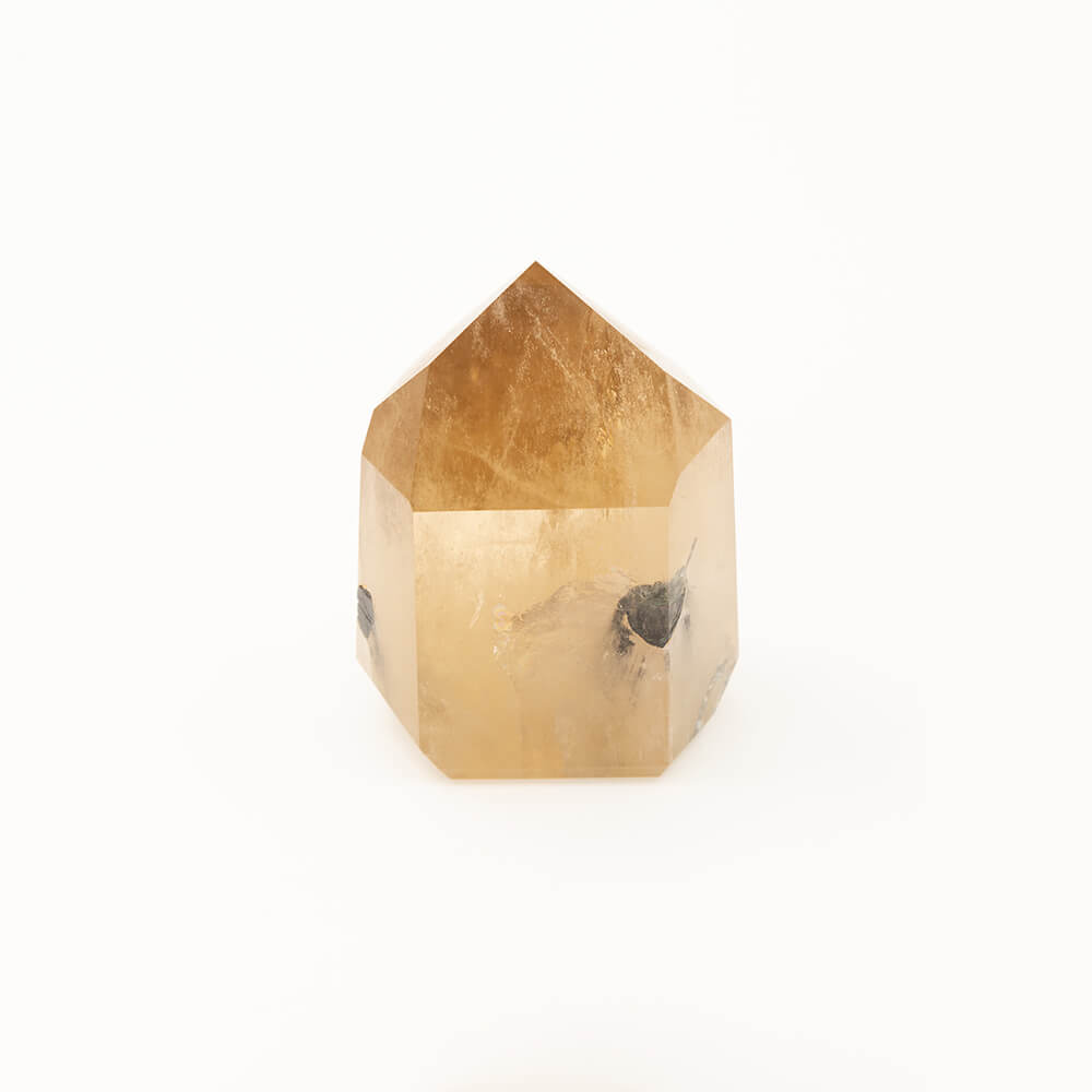 Rare and beautiful crystal point of natural Citrine with Tourmaline inclusions. Impeccable polish and color hue. Size: approximately 4x3x2 inches. 