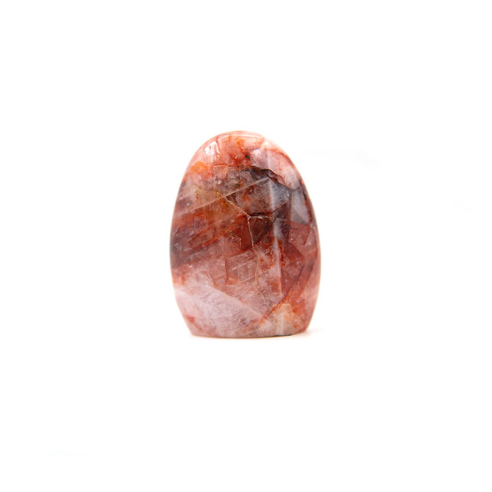 Carnelian stand up stone.  Nice polish with interesting inclusions of cream color accenting the red and orange. Size approximately 3x2.5x1 inches. Carnelian is said to enhance creativity of ideas and plans. It is supposed to bring new energy into one's mind and expel old ideas and habits that are no longer useful.
