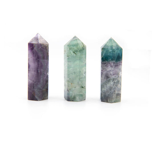 Multi-colored Flourite Tower Points with assorted colors. Brilliant smooth polish. 3 inches by almost 1 inch. These change color in a black light.