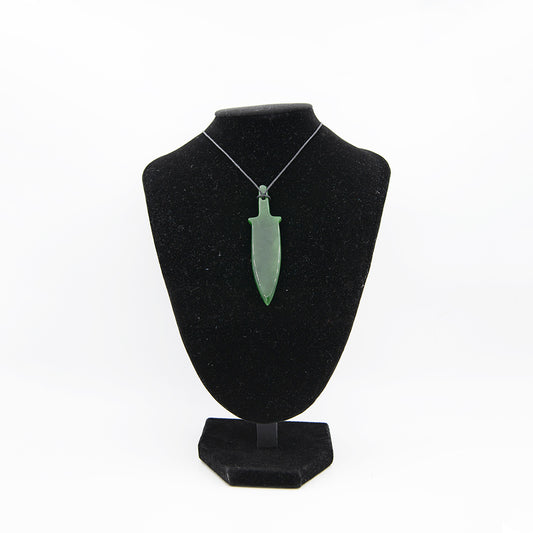 Polar Jade Dagger Style Pendant.  Impeccable color and workmanship on this beauty. The very finest Polar jade was used in this pendant carving.   One of a kind. 3 1/4 inches by 3/4 inch.