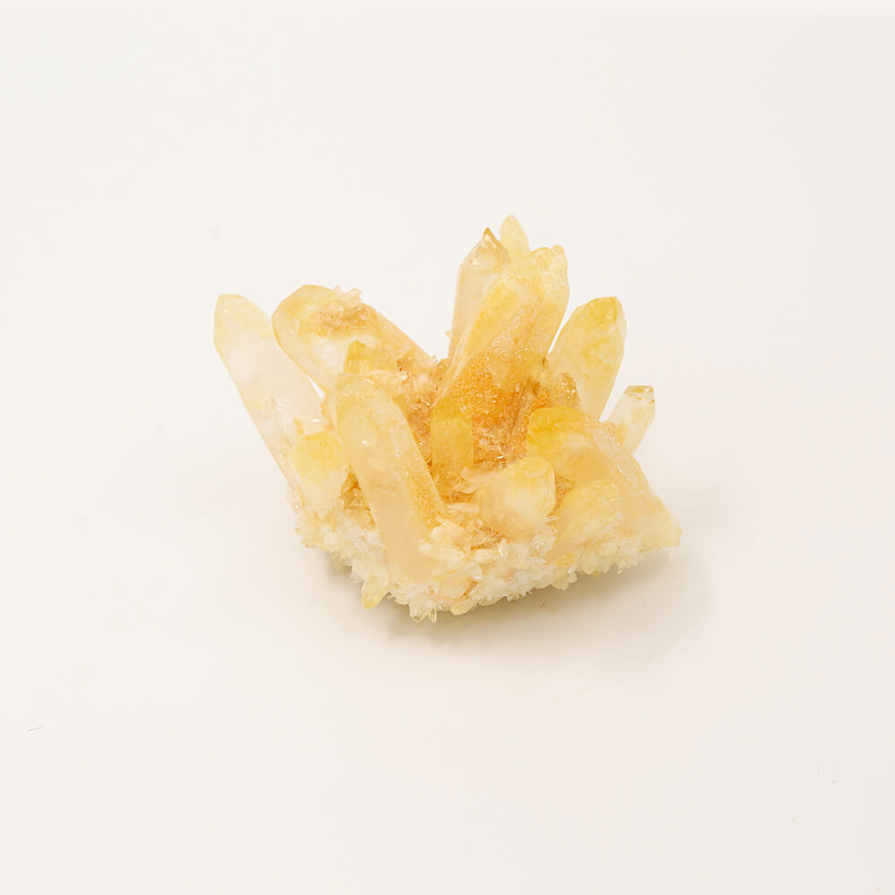 A fine golden Quartz cluster. Size: 3.25x3.25x2.75 inches. Said to be a crystal of healing.  Beautiful pale golden color. 