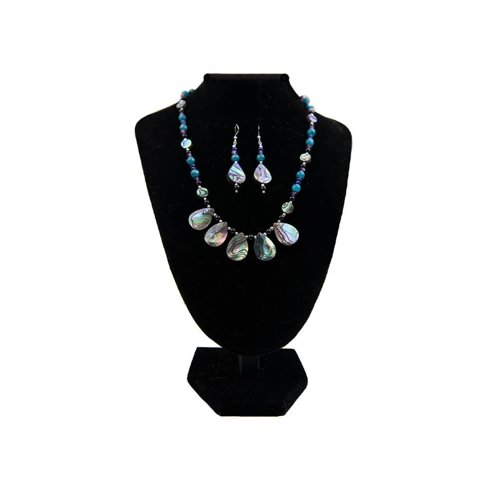 Made in Mendocino, California, this abalone necklace and earring set includes beads of Beautiful Abalone, Blue Apatite, Purple Amethyst, Black Onyx and Sterling Silver with Sterling ear wires. A bit over 16 inches long. Earrings are 1 3/4 inches long.