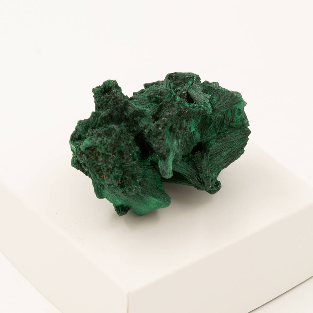 This Malachite is sourced from the Congo in Africa. Size: 3x2x2.5 inches. The piece has crystal sprays with a velvety looking finish. Very nice specimen.
