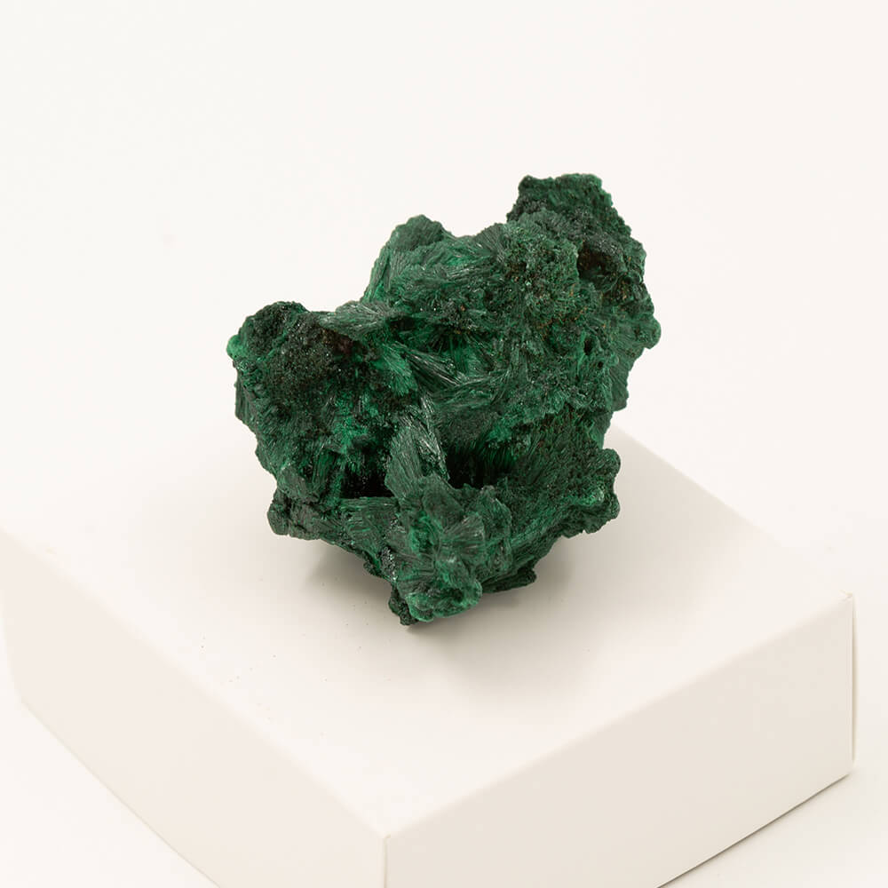 This Malachite is sourced from the Congo in Africa. Size: 3x2x2.5 inches. The piece has crystal sprays with a velvety looking finish. Very nice specimen.