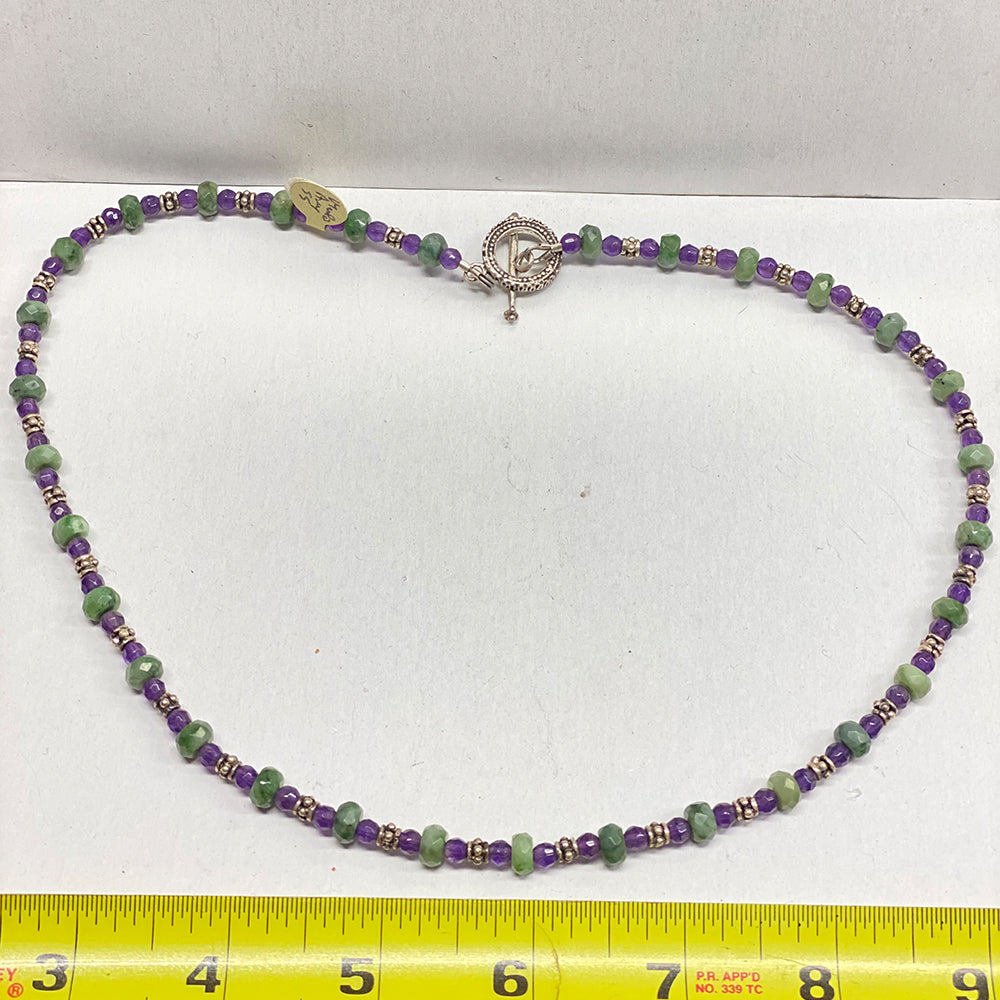 Beautiful faceted California Jade from Mendocino County, combined with Brazilian Amethyst and sterling silver beads. 20 inches in length with toggle clasp. The Jade beads are approx. 7mm and the amethyst beads are approx. 4mm.