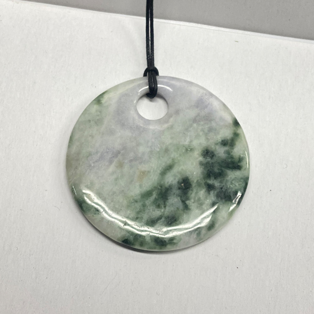Burmese Jadeite Round Pendant.  Dark green to white patterns.  Polished finish.  Handmade.