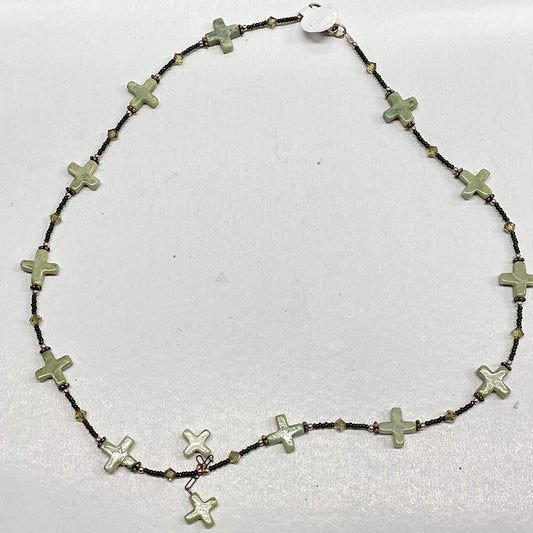 Positive Attitude California Jade Necklace.  Strung with California Jade plus signs.  Dainty green glass seed beads, small sterling and Swavorski crystals make up the balance of this 18 inch long beauty. A light and sweet piece.