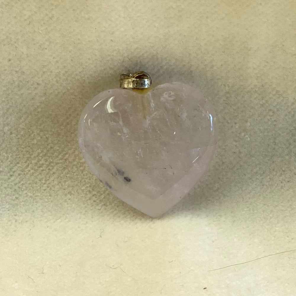 Handcrafted Clear Quartz Heart with stainless steel pendant ring.   A sweet petite heart pendant.  Size: 1 inch.