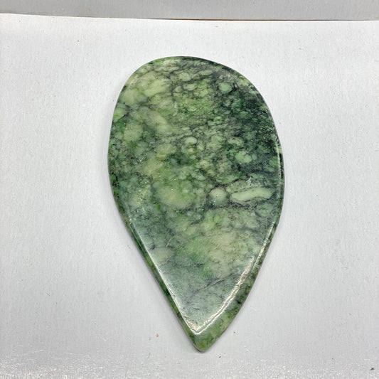 Botryoidal Jade Slice.Beautiful Greens with intricate patterns.  Artisan cut from the center of a botryoidal Jade nugget.  Semi polished.  Approx. 5 x 3 inches.  One of a kind.