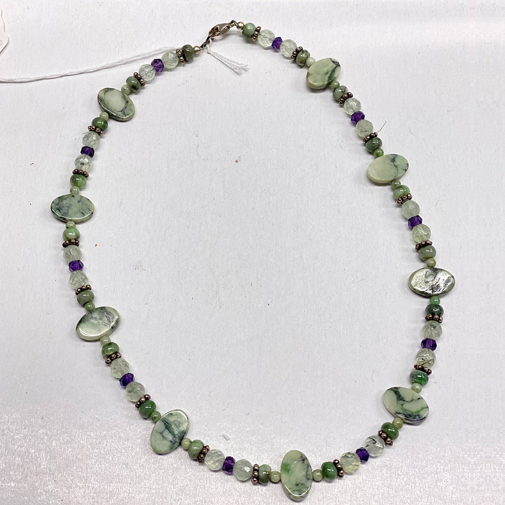 RiverBlossom Jade, Amethyst, Prehnite Necklace.  A great combination of minerals were used to create this necklace that no one else will have.  Everything used in this piece is great quality.  The Jade used in this piece was sourced from our helicopter trips to our private property in the Trinity Alps area in California.