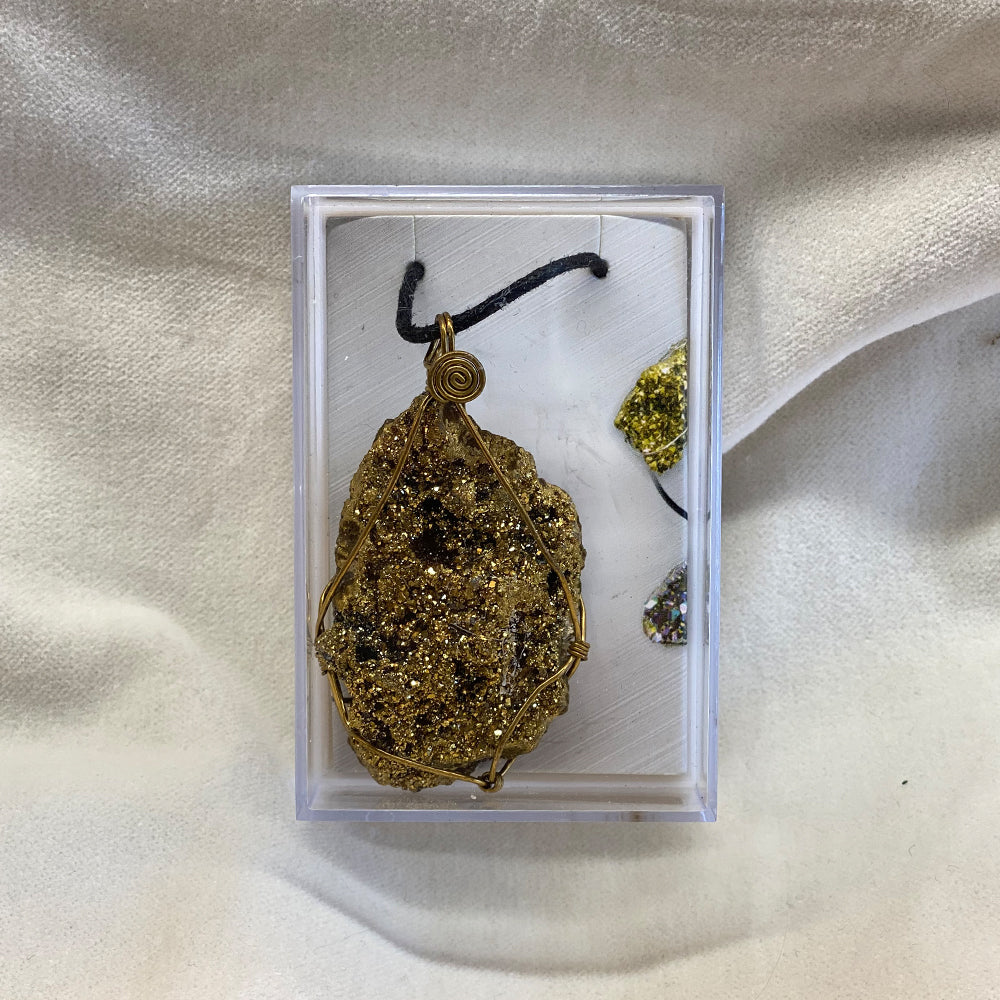 Wire Wrapped Drusy Gold Aura Pendant.   Natural crystal formations.  A beautiful sparkly wire wrapped Gold Aura pendant.   Size: approx. 2 inches by over 1 inch.   It is said that gold is the color of inspiration.
