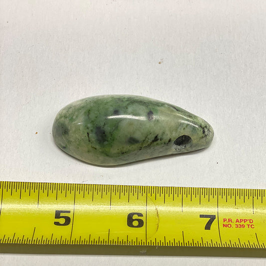 Polished Jade Drilled Stone.  One of a kind.  Size: 2 1/4 x 1 inch.   Large drilled hole for stringing if you choose to wear it.   