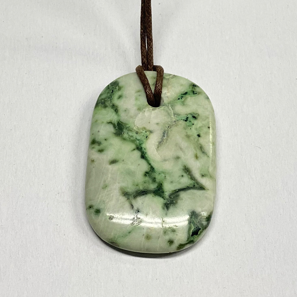 RiverBlossom Jade Pendant.  Nice large statement pendant.  Gorgeous RiverBlossom Jade with super interesting patterns and vibrant colors throughout.  The Jade used in this piece was sourced from our helicopter trips to our private property in the Trinity Alps area in California