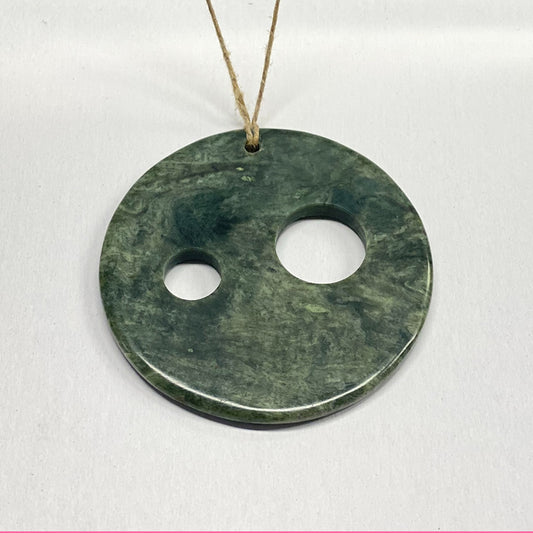 California Jade Sun, Earth and Full Moon Pendant.  This piece represents the astronomy of the Sun, Earth and full Moon.  Jade is matte finished.  Classic celestial symbolism.  Sourced in California from the Eel River.